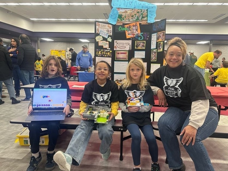 LEGO Robotics teams pose at competition