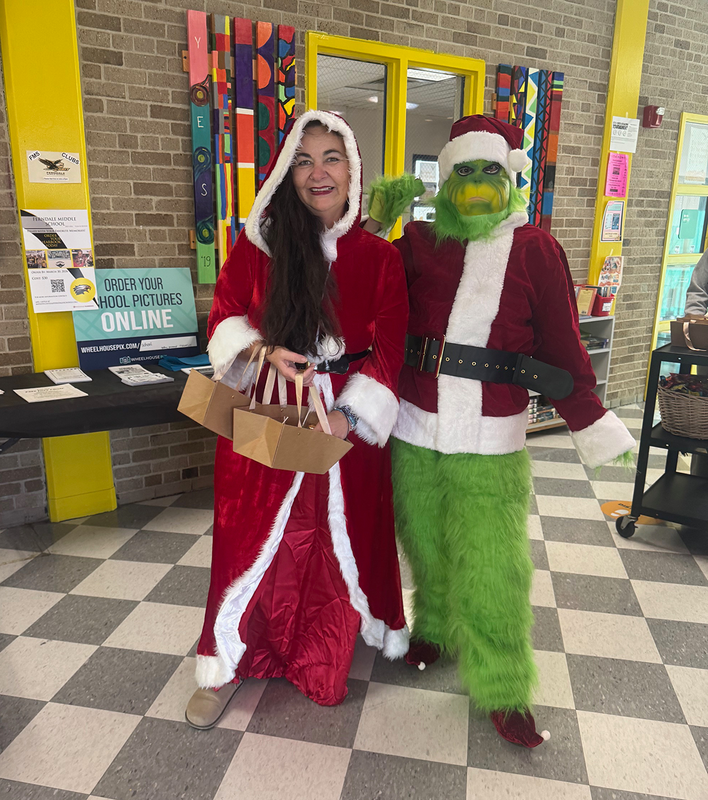 Mrs Clause and The Grinch visited FMS