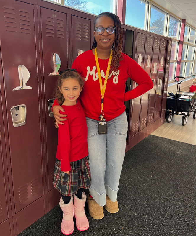 Student takes on Principal role for the day, beside Superintendent Hibbler