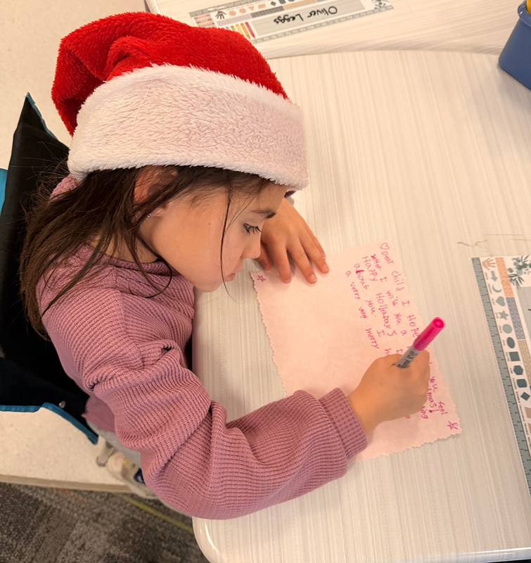 a student writes a note of care