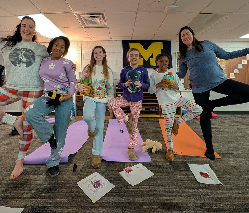 FUEL students practice yoga