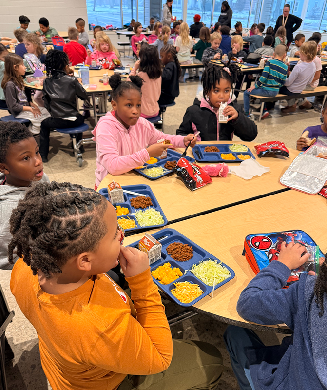 students use new hi-durability reusable lunch trays.