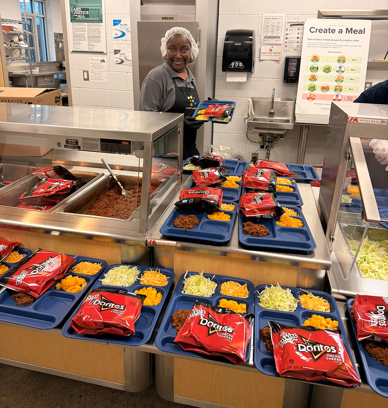 students use new hi-durability reusable lunch trays.
