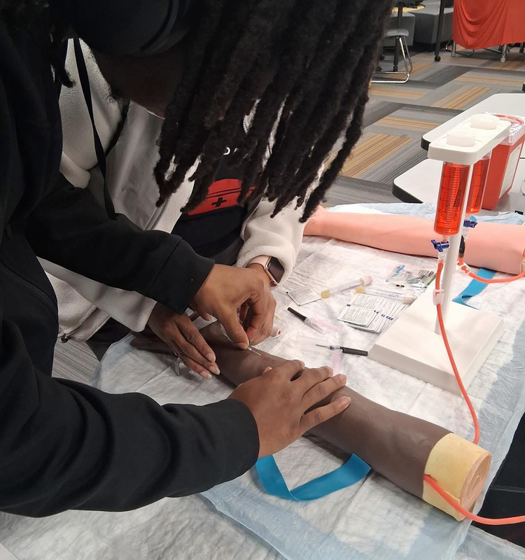 UHS Students explore healthcare careers and practice medical techniques.