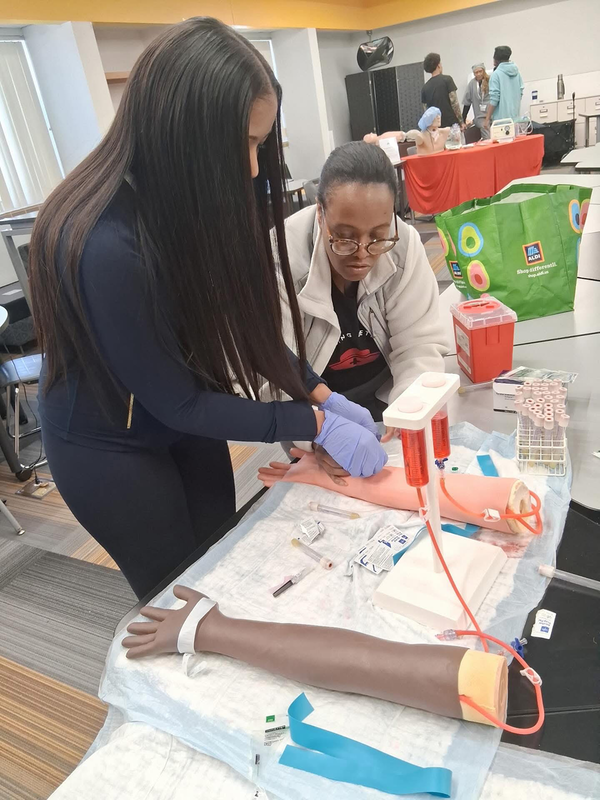 UHS Students explore healthcare careers and practice medical techniques.