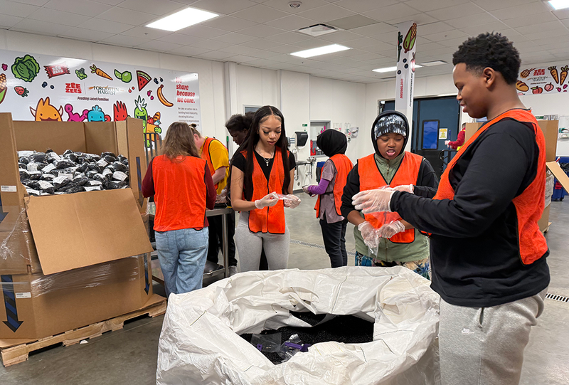 UHS students volunteer with Forgotten Harvest