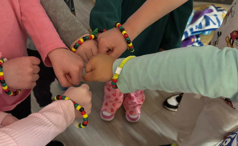 students made bracelets using the  4  pan-African colors popularized by Marcus Garvey.