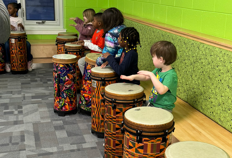 students play bongos
