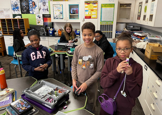 students explore STEM tools