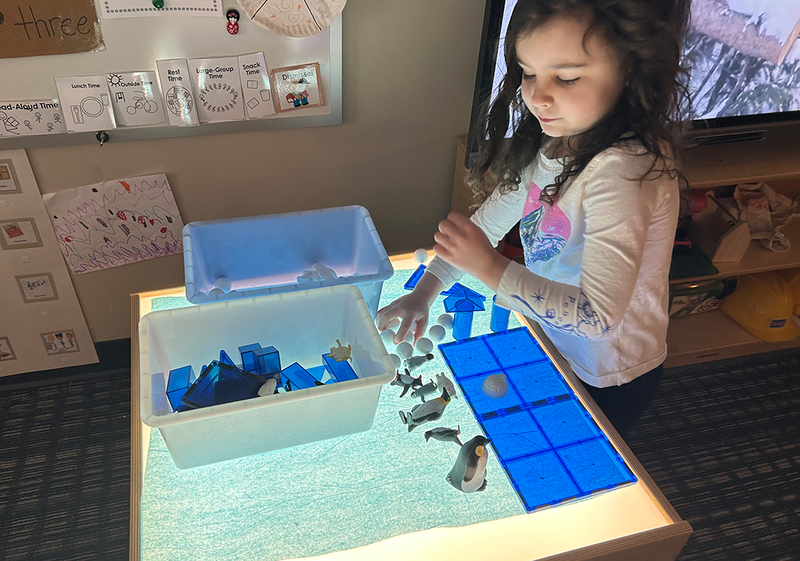 FECC students play with toys during Winter Break camp