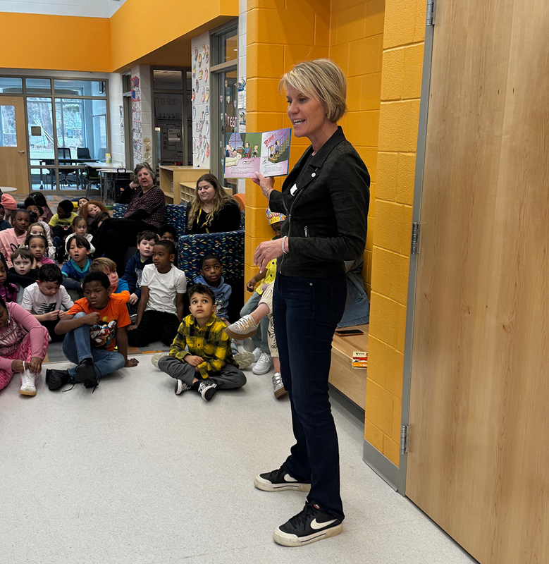 Karen Drew reads to FLower students