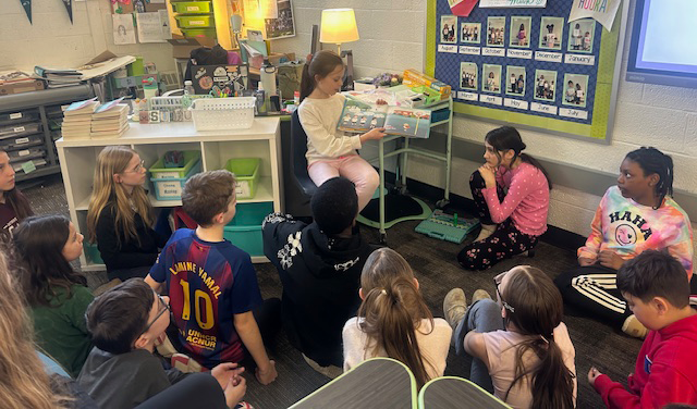 FUEL Student Council member reads to her classmates as a guest reader