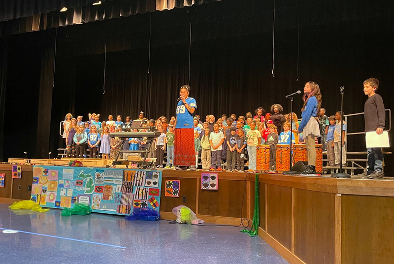 Elementary students danced and sang