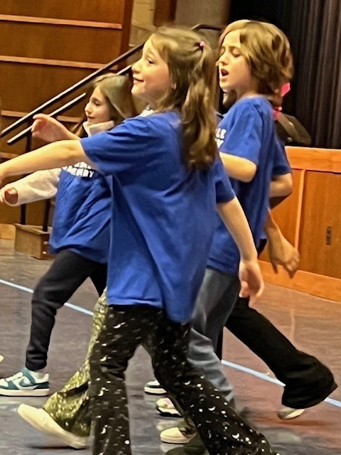 Elementary students danced and sang