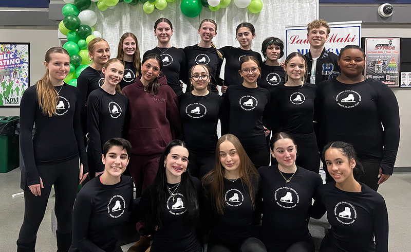 Skate team poses at state competition