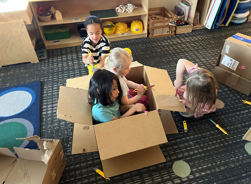 students build with kid-friendly carving tools called Makedo