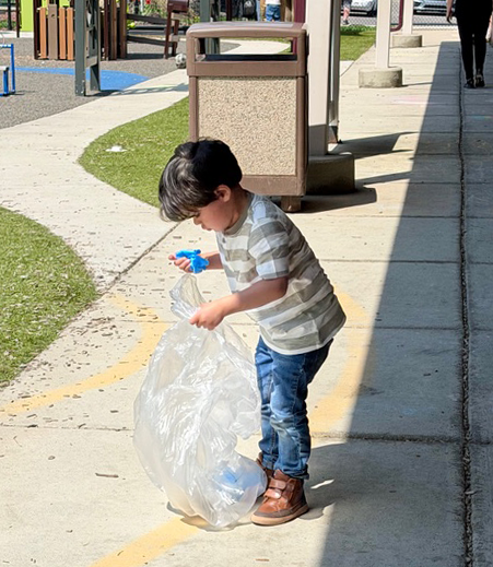 students and staff clean-up for Earth Week