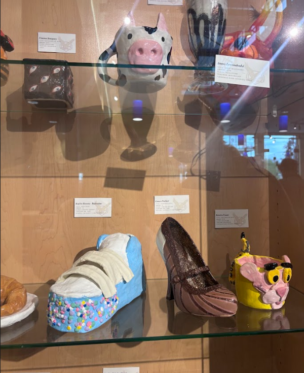 families view student art from UHS Art Club