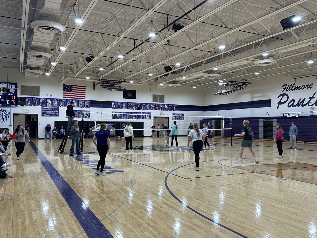 High School students playing volleyball as a part of their class competitions.