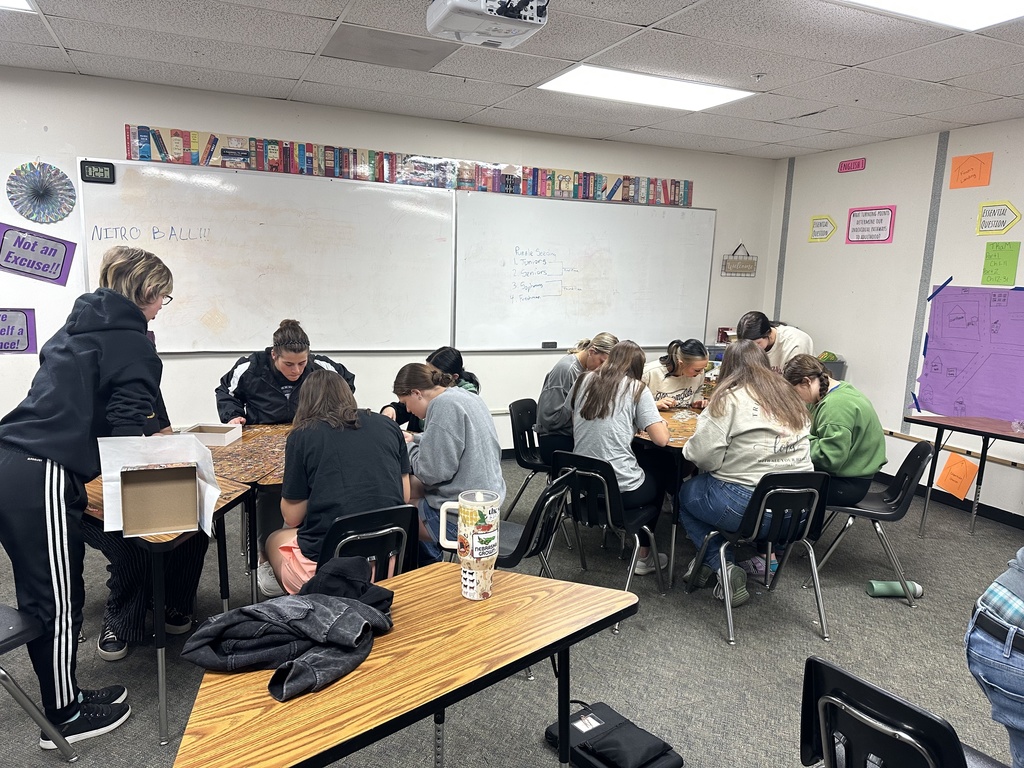 High School students working on a puzzle as a part of their class competitions.