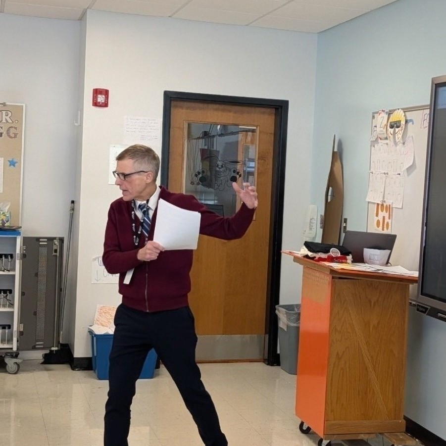 McLean County Museum of History Librarian Bill Kemp teaches 7th graders about the 1730 massacre of the Meskwaki tribe West of Fisher.