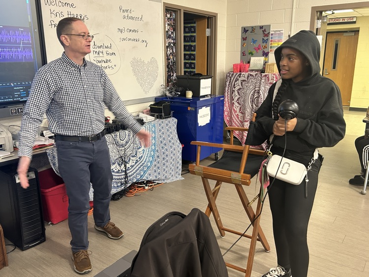 Mr Harris with a student