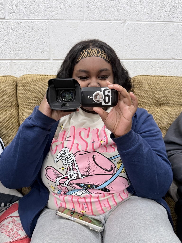 Student practices using the camera