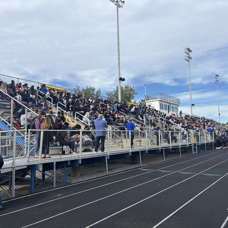 students in bleachers at the afternoon pep rally