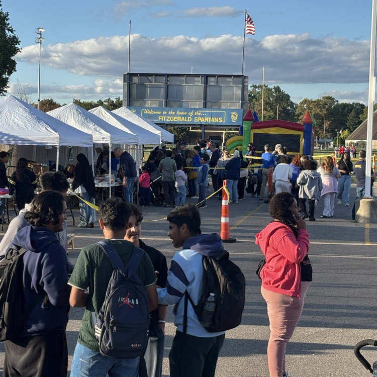 families lined up for Fitz Swag and books
