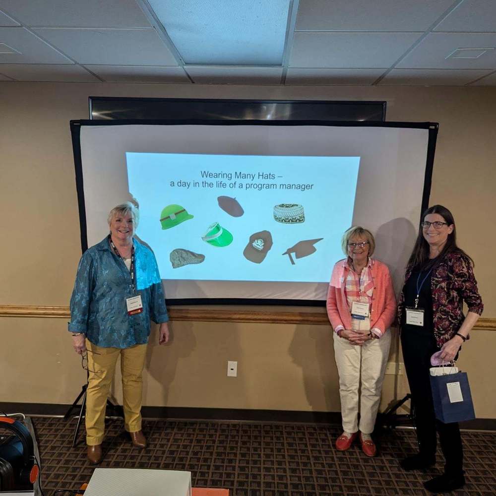 adult education staff giving presentation
