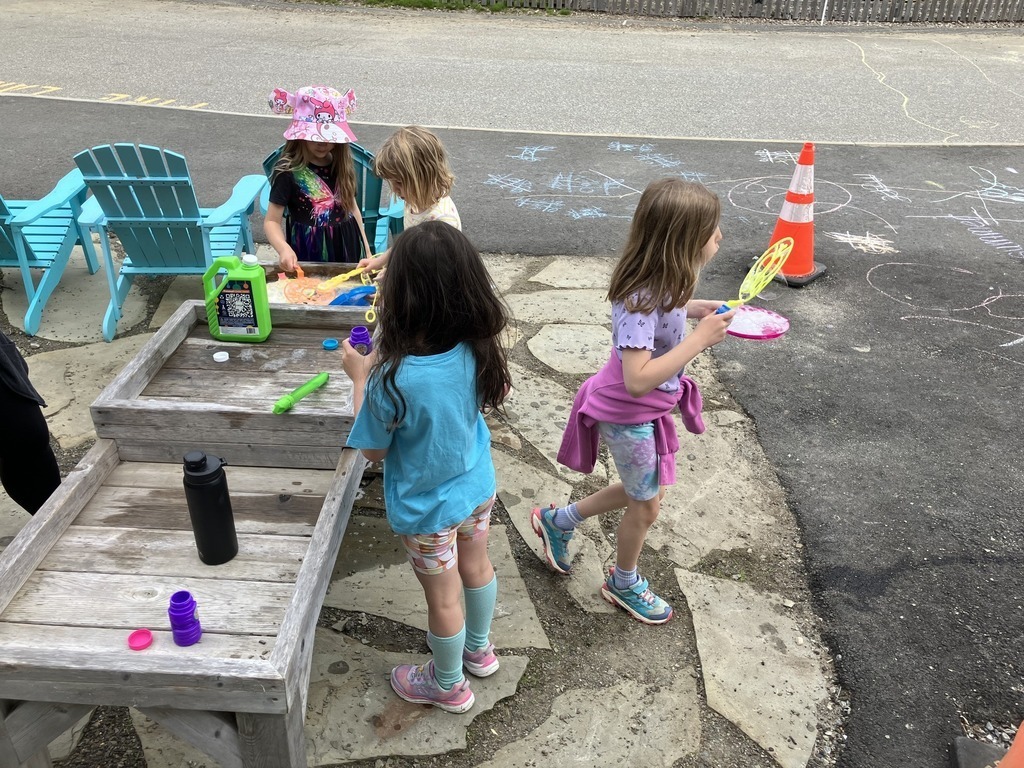 students at the bubble table