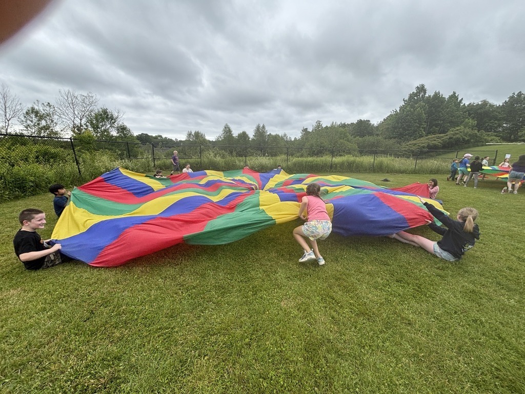 students with a parachute