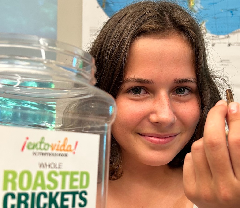 student eating crickets