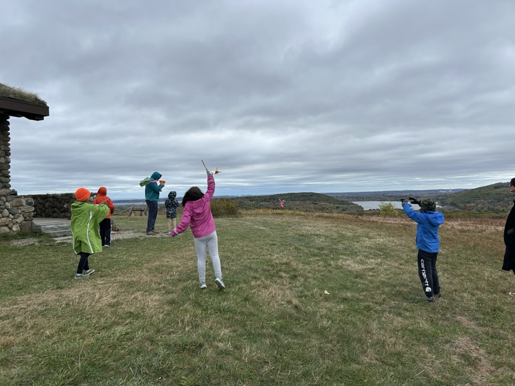 students flying kites