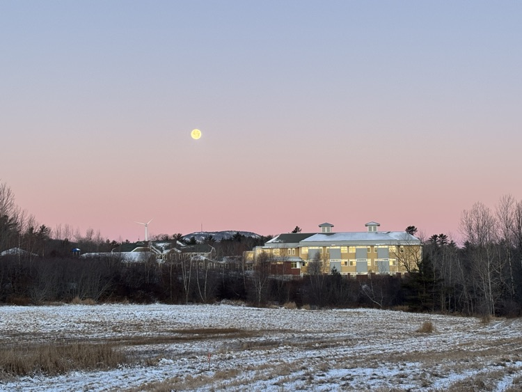 moonrise over school building 