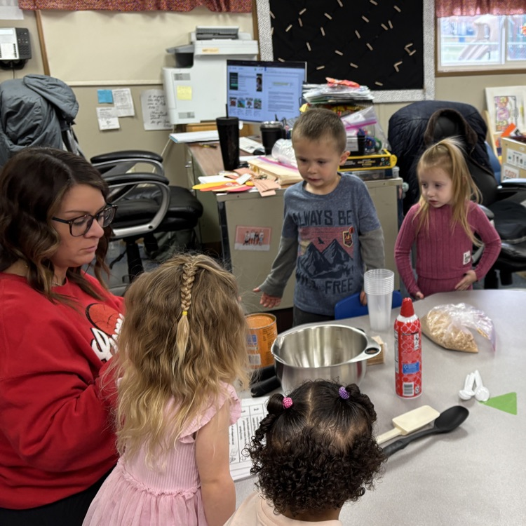 Ms. Decker’s AM PreK making and eating pumpkin pie in a cup.