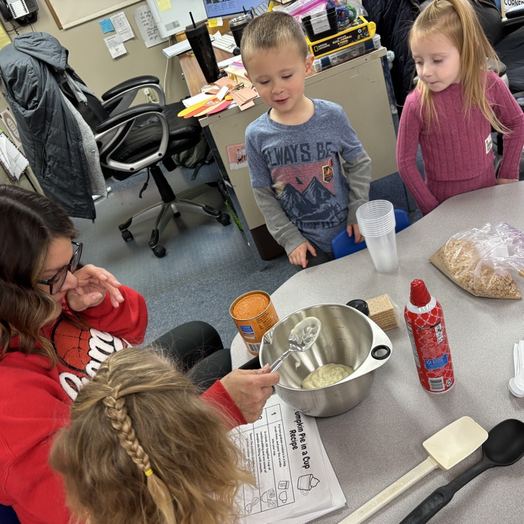Ms. Decker’s AM PreK making and eating pumpkin pie in a cup.