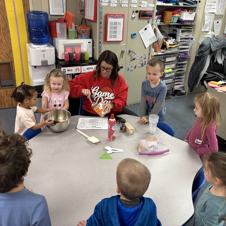 Ms. Decker’s AM PreK making and eating pumpkin pie in a cup.