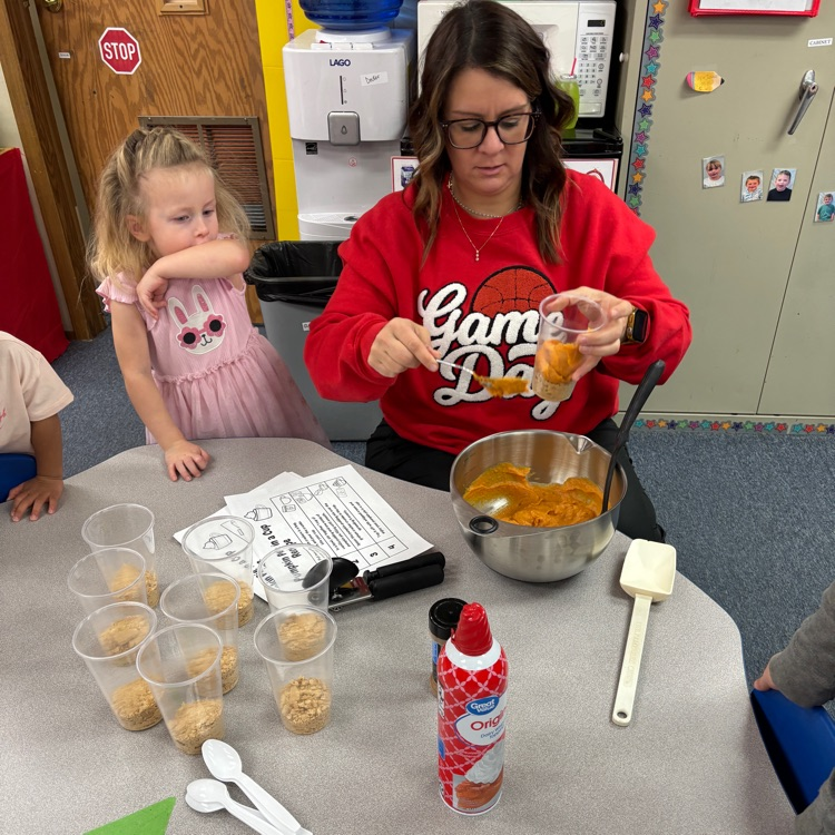 Ms. Decker’s AM PreK making and eating pumpkin pie in a cup.