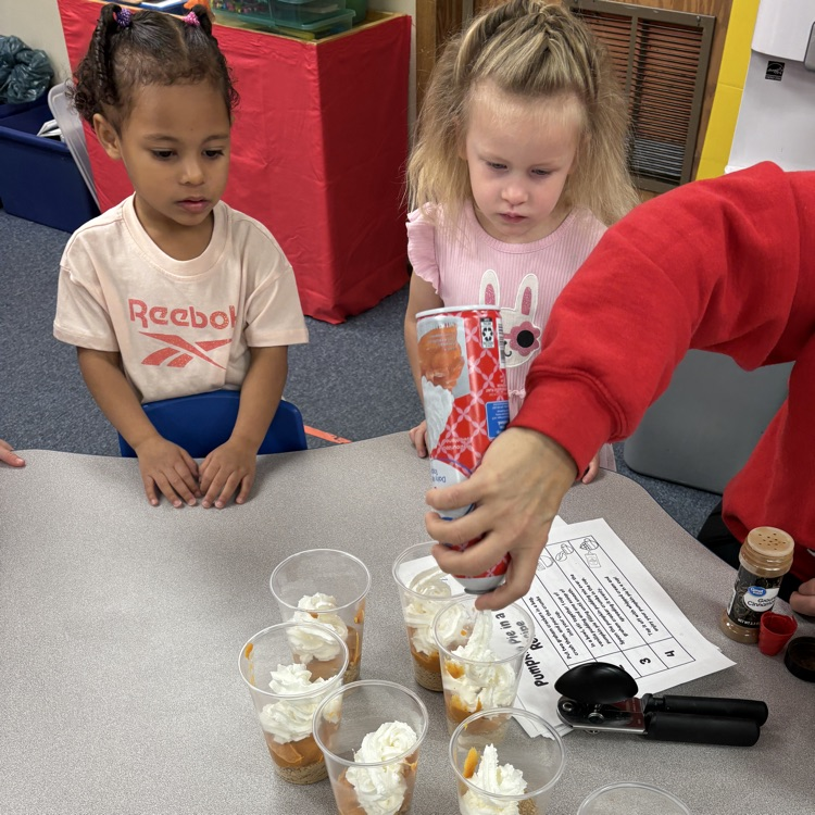 Ms. Decker’s AM PreK making and eating pumpkin pie in a cup.