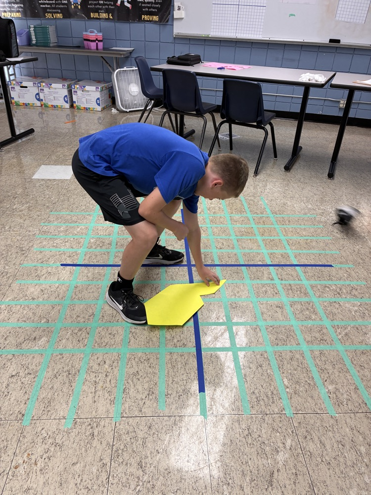 student reflecting shape