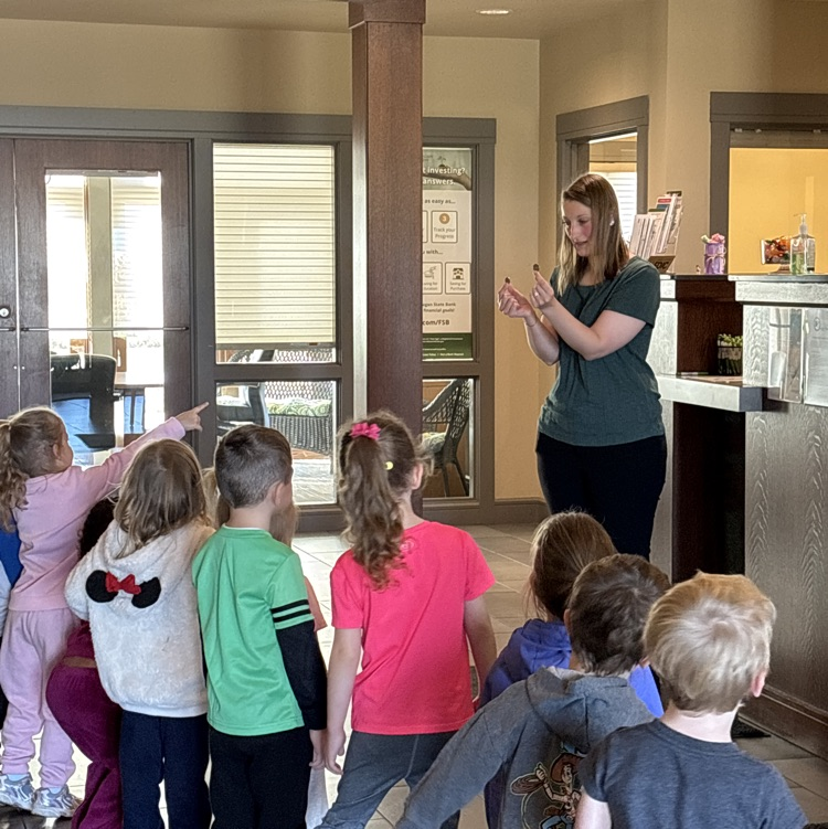 Mrs. Harrison showing us some coins 