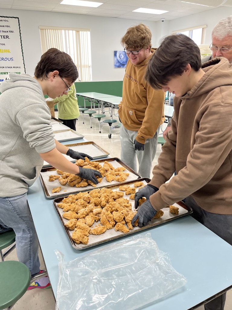 Wyatt, Lincoln and Matthew making hot wings