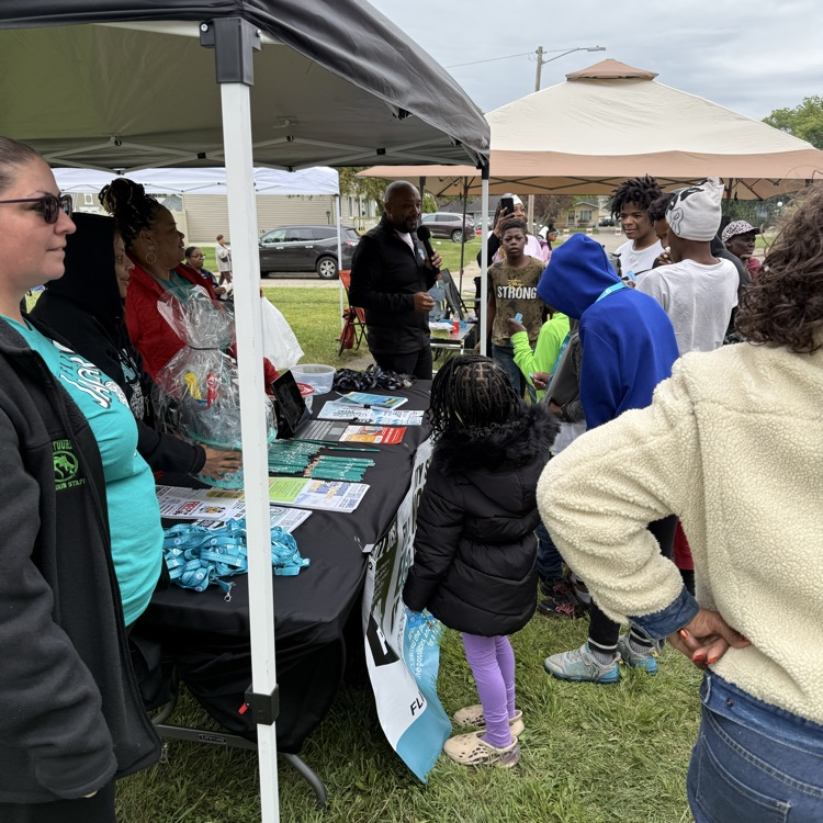flint community schools at Brownell Holmes neighborhood association porchfest celebration