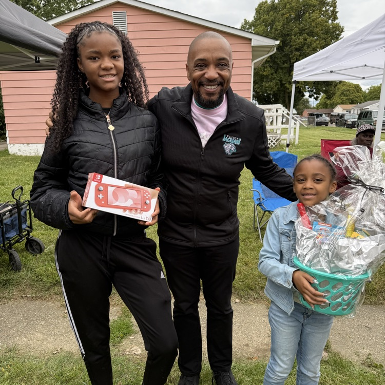 flint community schools at Brownell Holmes neighborhood association porchfest celebration