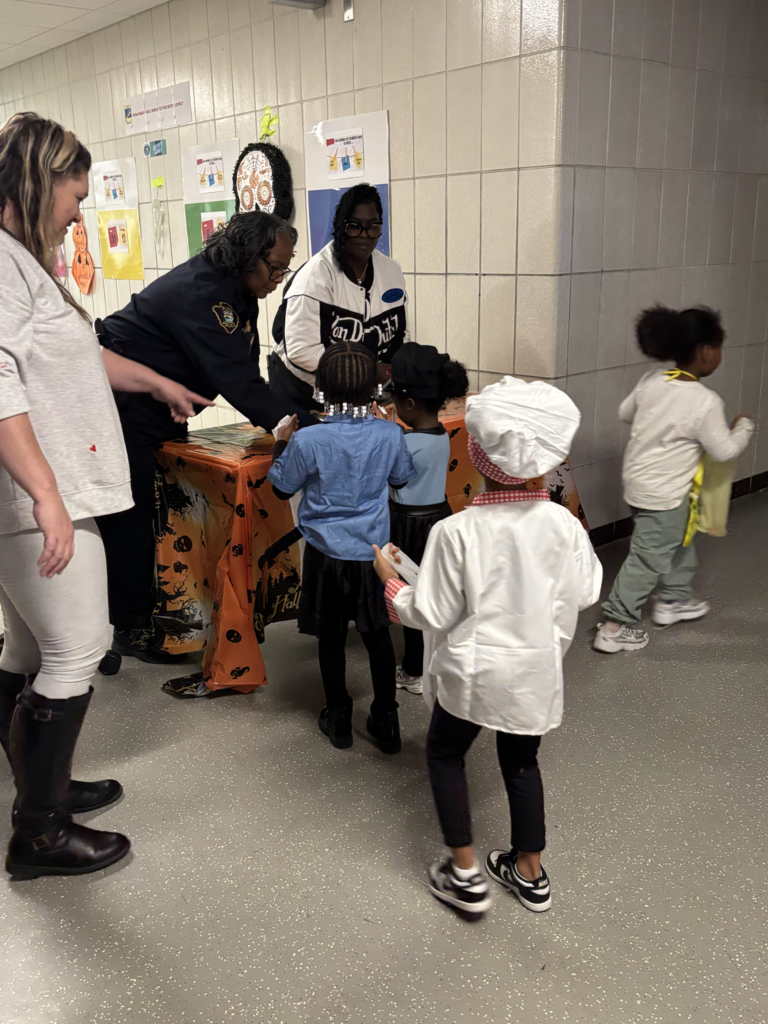 Holmes hosted its 5th Annual Halloween Block Party, giving scholars an afternoon filled with candy, games, prizes, movies, music, and plenty of spooky fun! The celebration also included a special treat for our younger scholars! Brownell STEM Academy scholars joined in the fun for some trick-or-treating, sharing smiles, sweet treats, and Halloween cheer with their Holmes friends.