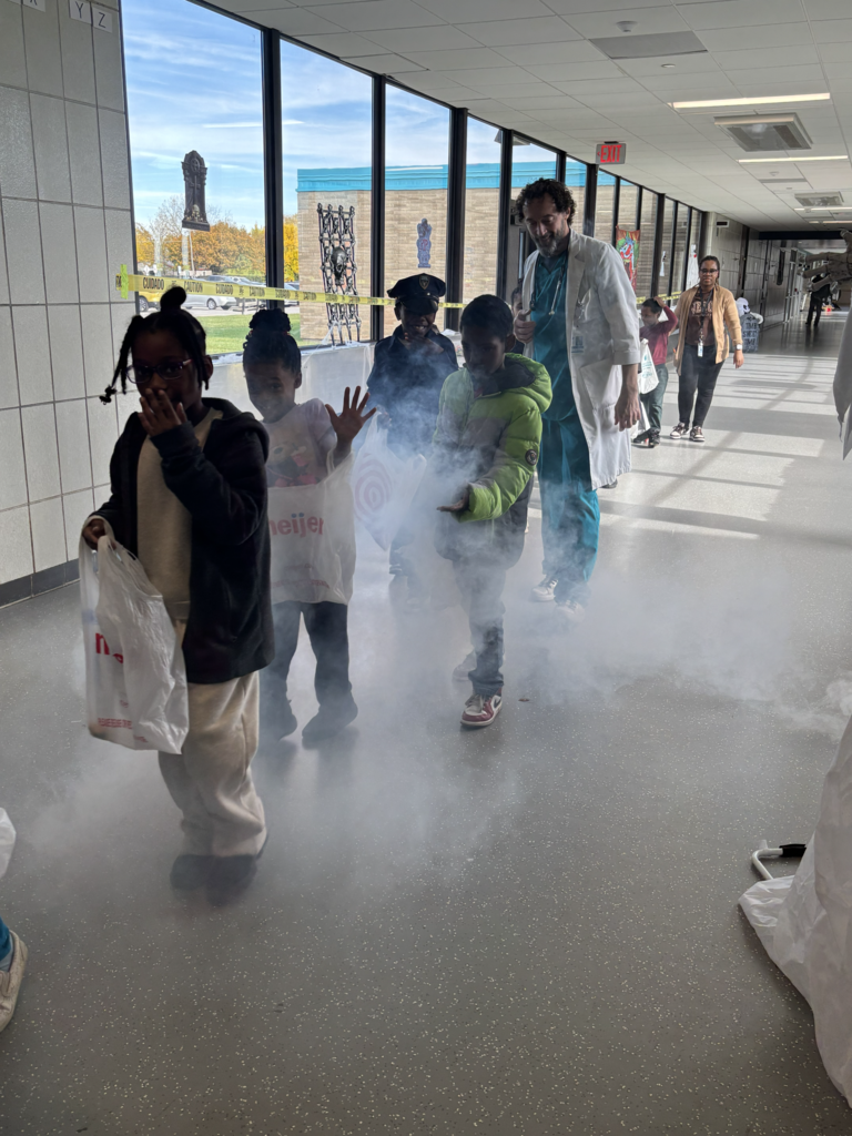Holmes hosted its 5th Annual Halloween Block Party, giving scholars an afternoon filled with candy, games, prizes, movies, music, and plenty of spooky fun! The celebration also included a special treat for our younger scholars! Brownell STEM Academy scholars joined in the fun for some trick-or-treating, sharing smiles, sweet treats, and Halloween cheer with their Holmes friends.