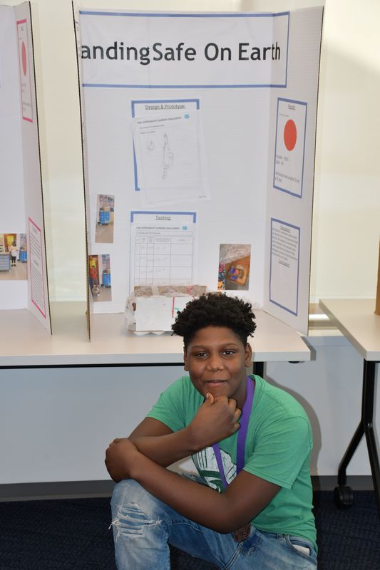 Brownell STEM Academy scholars show off their STEM projects and awards from the Elementary Flint Regional Science and Engineering Fair