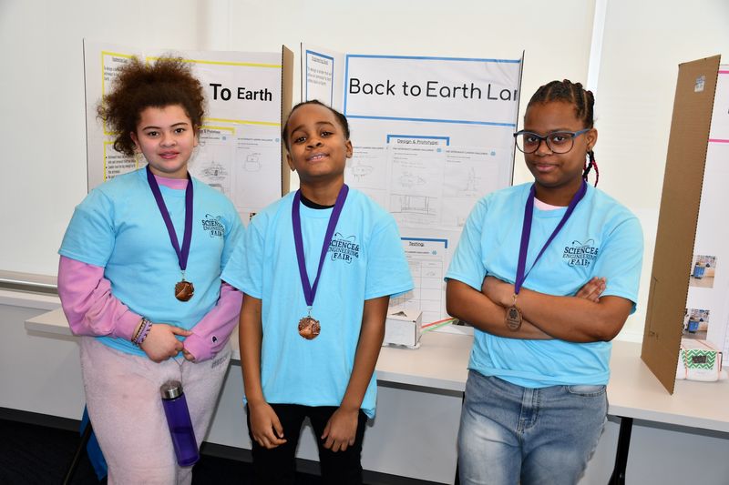Brownell STEM Academy scholars show off their STEM projects and awards from the Elementary Flint Regional Science and Engineering Fair