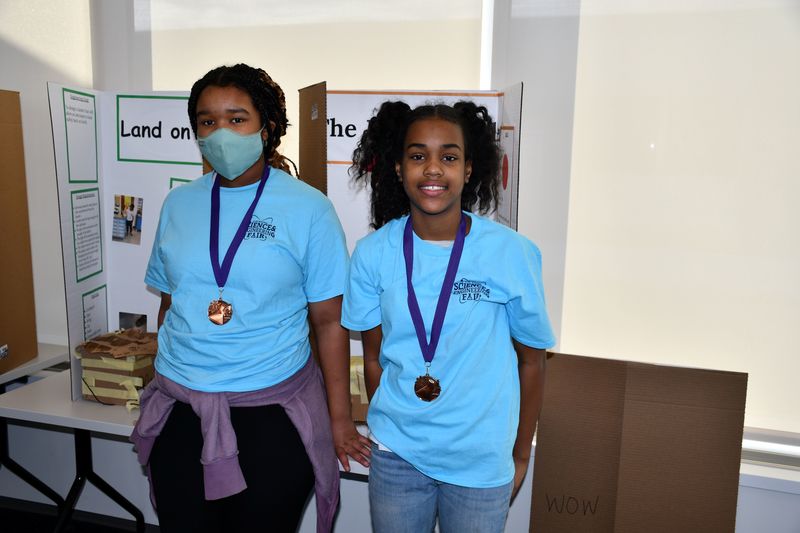 Brownell STEM Academy scholars show off their STEM projects and awards from the Elementary Flint Regional Science and Engineering Fair